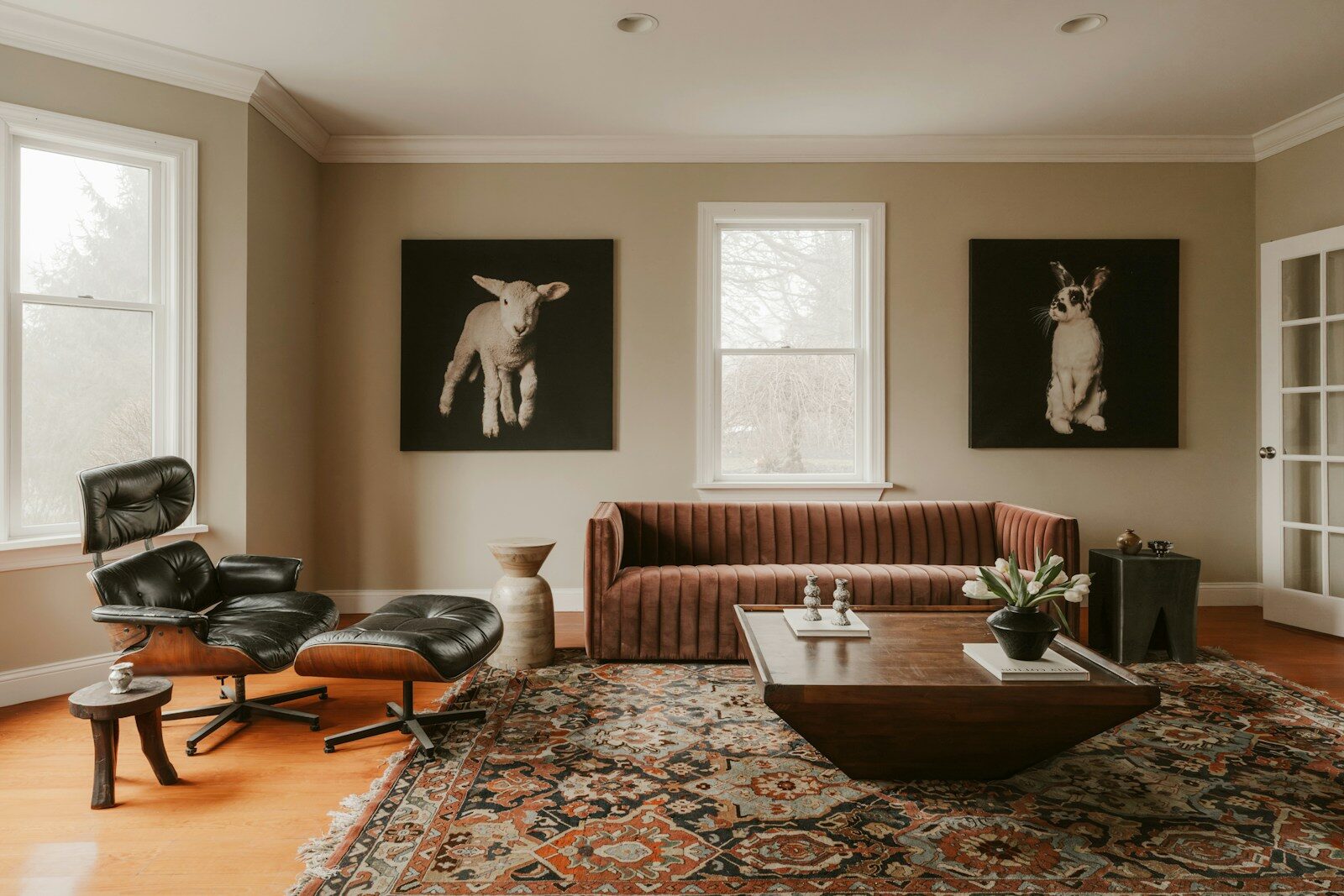 Living room with modern furniture and animal art